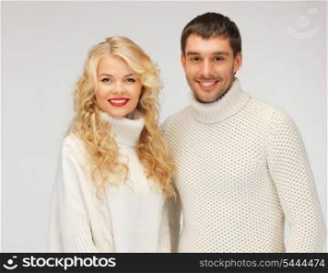 bright picture of family couple in a sweaters