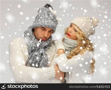 bright picture of family couple with thermometer