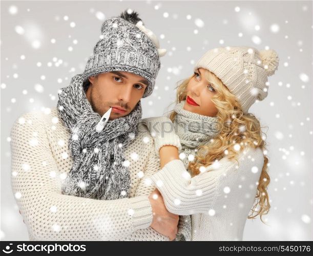 bright picture of family couple with thermometer