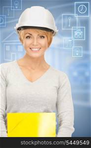bright picture of female contractor in helmet over white.