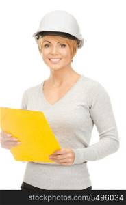 bright picture of female contractor in helmet over white&#xA;
