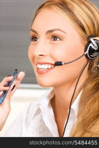 bright picture of friendly female helpline operator