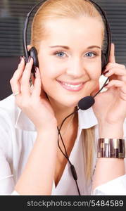 bright picture of friendly female helpline operator