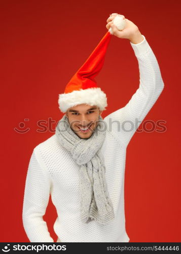 bright picture of handsome man in christmas hat.