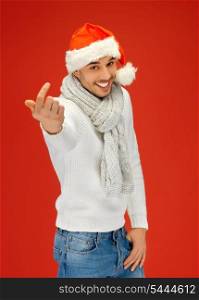 bright picture of handsome man in christmas hat.