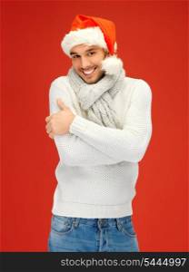 bright picture of handsome man in christmas hat.
