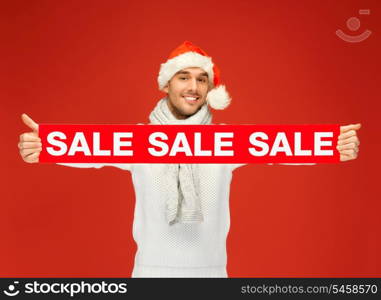 bright picture of handsome man in christmas hat.