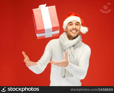 bright picture of handsome man in christmas hat.