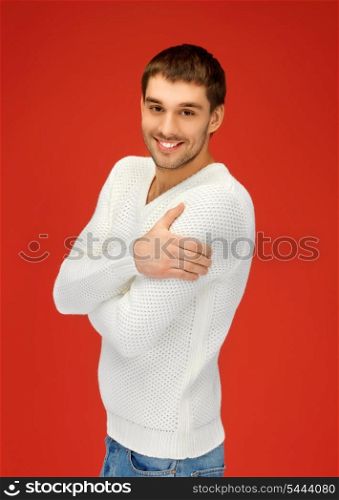 bright picture of handsome man in warm sweater.