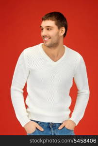 bright picture of handsome man in warm sweater.