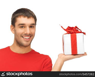 bright picture of handsome man with a gift .