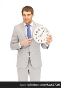 bright picture of handsome man with clock.....