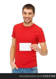 bright picture of handsome man with note card.