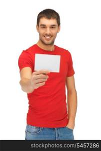 bright picture of handsome man with note card.