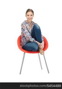 bright picture of happy and carefree teenage girl in chair