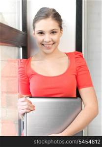 bright picture of happy and smiling teenage girl with laptop