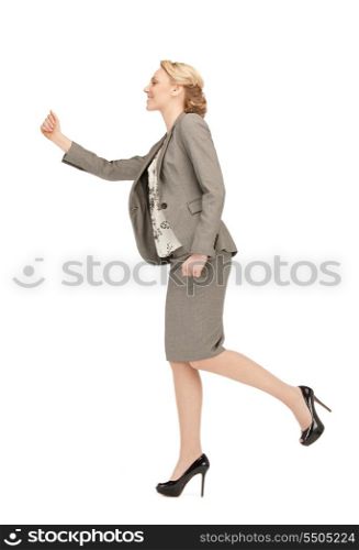 bright picture of happy and smiling walking woman