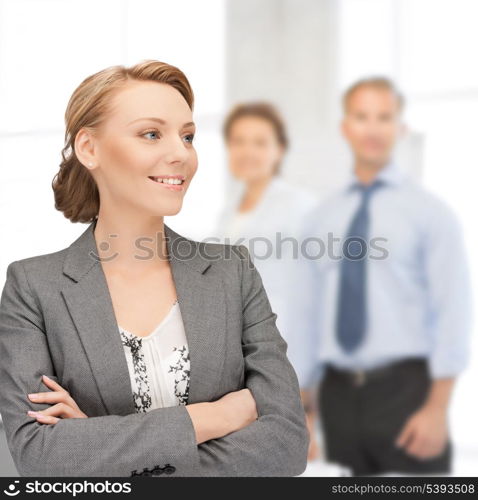 bright picture of happy and smiling woman in office