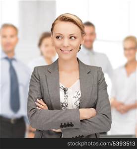 bright picture of happy and smiling woman in office