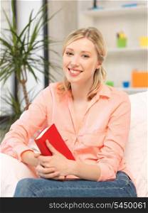 bright picture of happy and smiling woman with book..