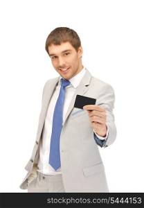 bright picture of happy businessman with credit card