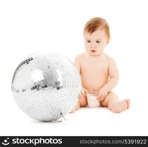 bright picture of happy child playing with disco ball