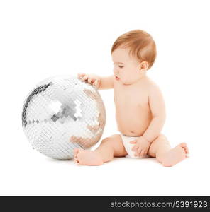 bright picture of happy child playing with disco ball