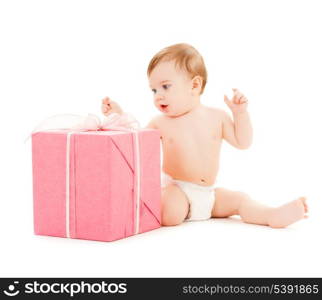 bright picture of happy child with gift box.