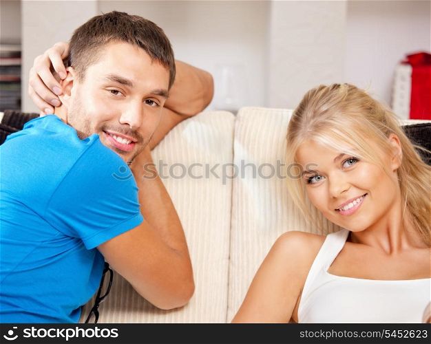 bright picture of happy couple at home (focus on man)