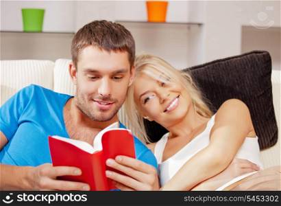 bright picture of happy couple with book