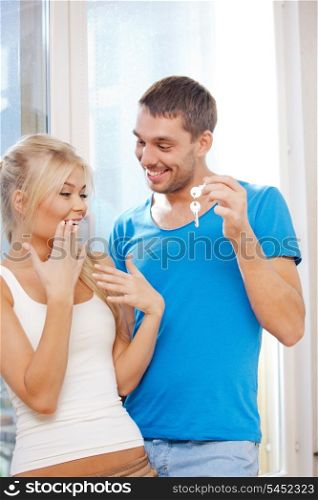 bright picture of happy couple with keys