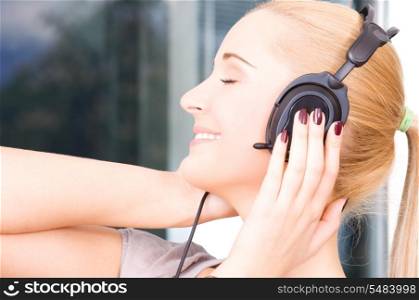 bright picture of happy girl in headphones