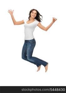 bright picture of happy jumping woman in blank white t-shirt.