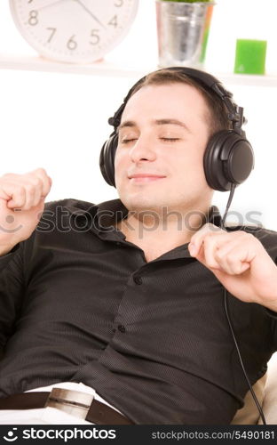 bright picture of happy man in headphones