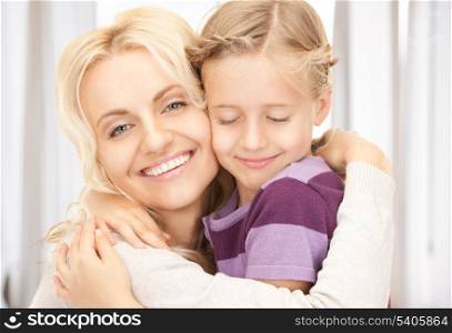 bright picture of happy mother and child (focus on woman)
