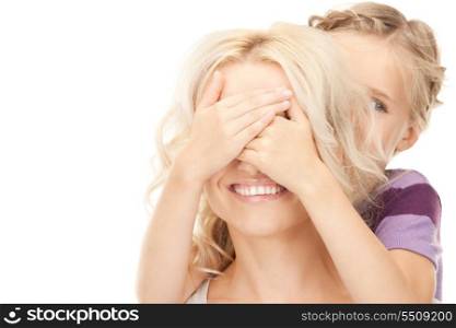 bright picture of happy mother and little girl (focus on hands)