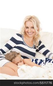 bright picture of happy mother and sleeping girl.