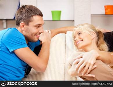 bright picture of happy romantic couple at home (focus on man)