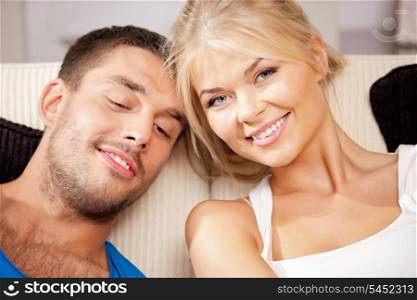 bright picture of happy romantic couple at home (focus on woman)
