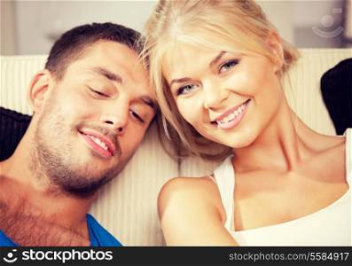 bright picture of happy romantic couple at home (focus on woman)