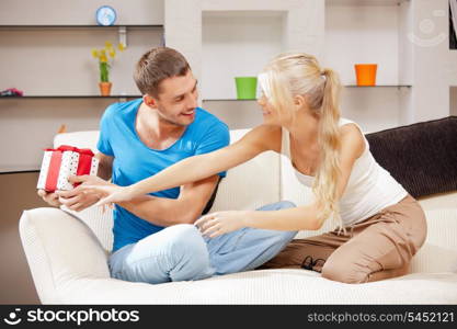 bright picture of happy romantic couple with gift