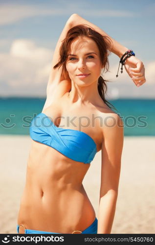bright picture of happy smiling woman on the beach.