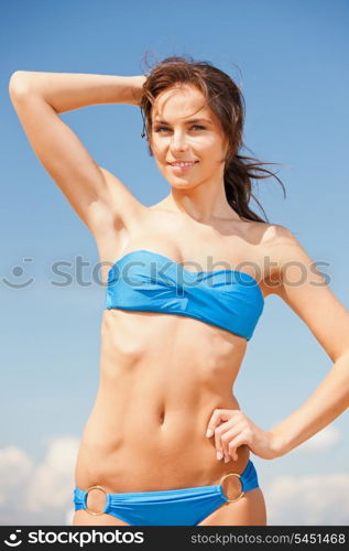 bright picture of happy smiling woman on the beach.