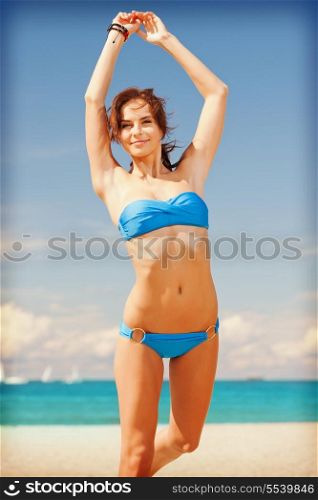 bright picture of happy smiling woman on the beach
