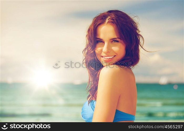 bright picture of happy smiling woman on the beach.. happy smiling woman on the beach
