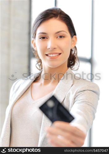 bright picture of happy woman with credit card
