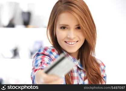 bright picture of happy woman with credit card