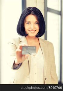 bright picture of happy woman with credit card. happy woman with credit card