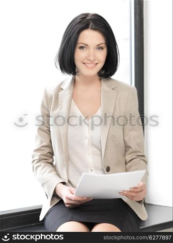 bright picture of happy woman with documents