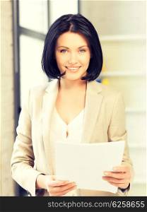 bright picture of happy woman with documents. happy woman with documents